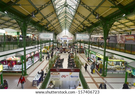 SOFIA, BULGARIA - SEPTEMBER 28: Unidentified people and different shops, cafe\'s and restaurants in the central Sofia market hall, on September 28, 2013, in Sofia, Bulgaria