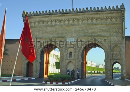 RABAT, MOROCCO - NOVEMBER 18: Unidentified police men at gate in medieval city wall and buildings, on November 18, 2014 in Rabat, Morocco