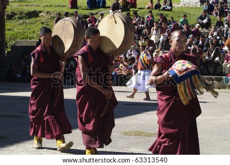 BHUTAN, SEPTEMBER 21, unknown monks with drums by a religious festival named Tshechu in the White Temple on September 21, 2007 in Haa, Bhutan