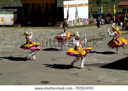 HAA-VALLEY, BHUTAN - SEPTEMBER 21: unidentified dancers with masks by religious festival named Tshechu in Haa, in the White Temple (Karpho Lhakhang) on September 21, 2007 in Haa-Valley, Bhutan