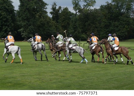 EBREICHSDORF, AUSTRIA - SEPTEMBER 05: horsemen from Hungaria (green) and Netherlands (orange)  European Polo Championship on September 05, 2010 on the fields of Castle Ebreichsdorf in  Austria
