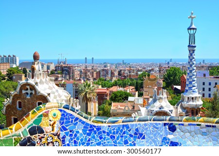 Park Guell by architect Antoni Gaudi in Barcelona, Spain. Focus on the panorama of the city of Barcelona