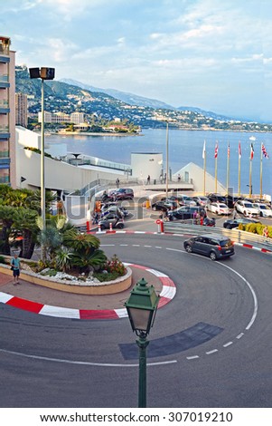 MONTE CARLO, MONACO - JUN 02, 2015: The Grand Hotel hairpin in Monte Carlo. Monte Carlo is host to the Formula One Monaco Grand Prix.