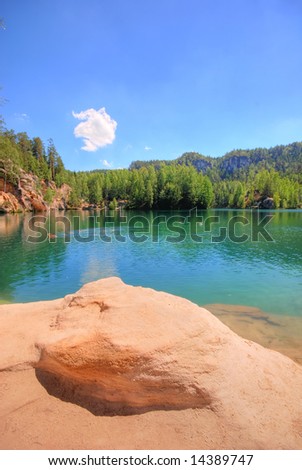 Emerald lake in Andrspach Rock City, Czech Republic