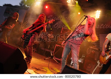 SIEDLCE, POLAND - JUNE 26: Rust perform on stage at Siedlecki Rock Open Air Festival on June 26, 2011 in Siedlce, Poland