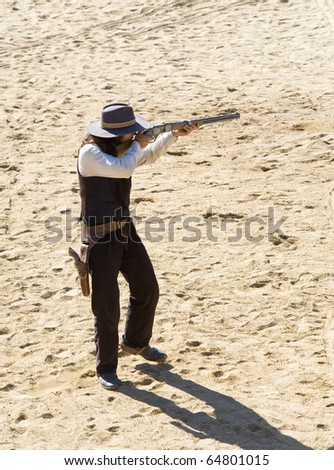Cowboy Sheriff shooting his rifle