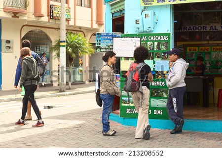 BANOS, ECUADOR - FEBRUARY 25, 2014: Unidentified people at the tour operator Tungurahua Explorer on the corner of 16 de Diciembre and Vicente Rocafuerte street on February 25, 2014 in Banos, Ecuador.