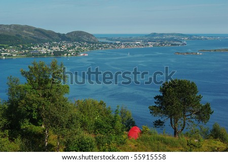 Camping above Aalesund, Norway with a view on the surrounding skerry landscape
