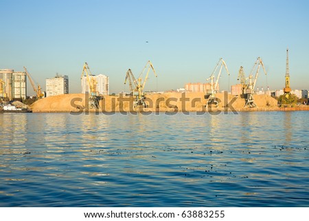 Loading sand in the river port