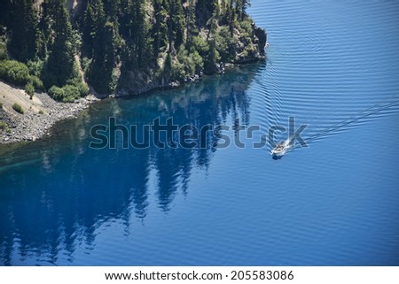 People taking a boat tour on Crater Lake