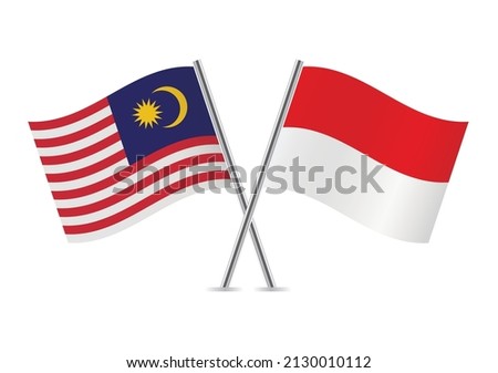 Malaysia and Indonesia crossed flags. Malaysian and Indonesian flags, isolated on white background. Vector icon set. Vector illustration.