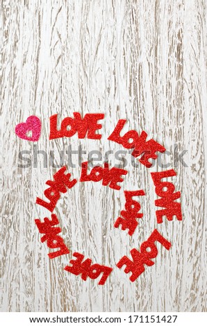 Eternal love on a wooden background.