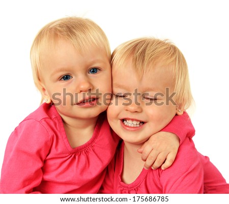Cute Two Year Old Identical Twin Girls Hugging. Stock Photo 175686785 ...