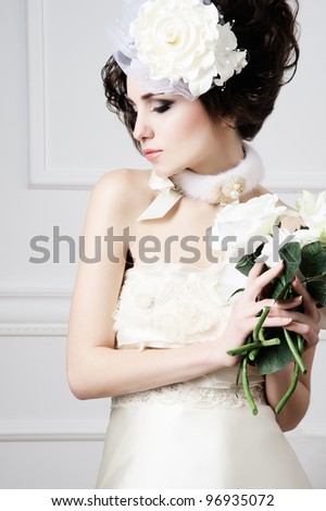 Portrait of beautiful retro bride with wedding bouquet