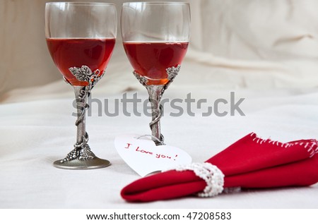 luxury wine glasses with red napkin