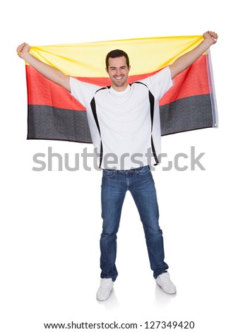 Portrait Of A Happy Man Holding An German Flag. Isolated On White Stock ...