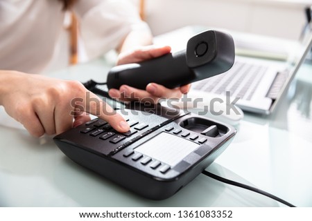 Similar – Image, Stock Photo Anonymous black businesswoman using smartphone at home