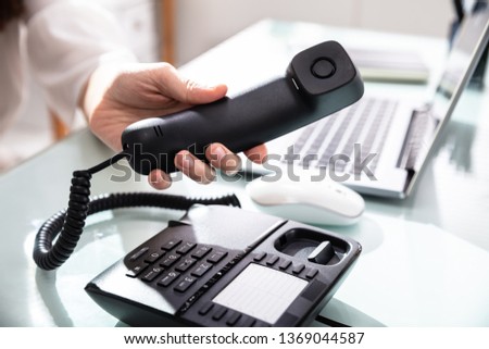 Similar – Image, Stock Photo Anonymous black businesswoman using smartphone at home