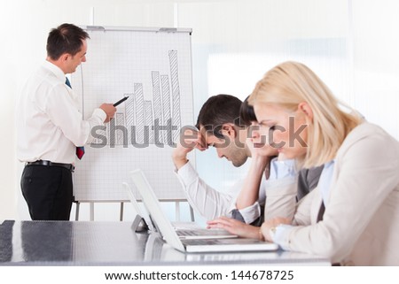 Frustrated Employees In The Office Business Meeting
