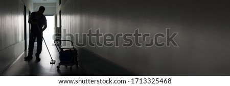 Janitor Worker Cleaning Office. Professional Cleaner Man Foto stock © 