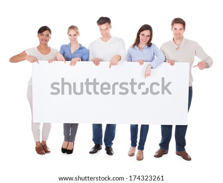 Group Of Happy People Holding White Billboard Over White Background