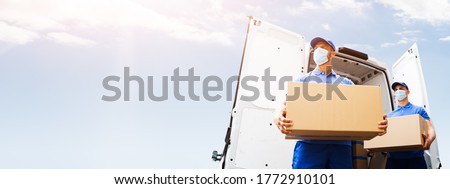 Furniture Move And Removal Using Truck Or Van With Face Mask Photo stock © 