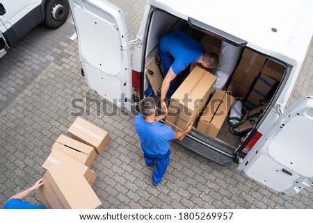 Open Truck Delivery. Mover Men Moving Boxes Photo stock © 