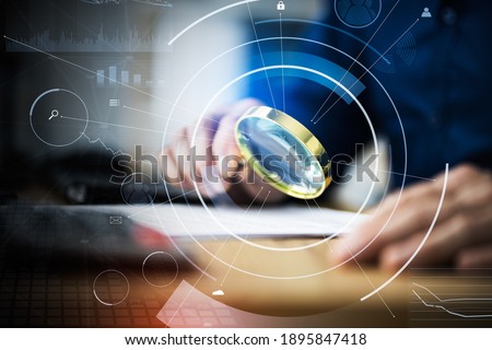 Business Auditor Using Magnifying Glass For Paperwork Fraud Investigation Stock foto © 