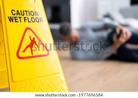 Slip Fall Accident. Floor Sign Caution And Safety Сток-фото © 