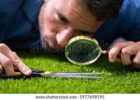 Compulsive Obsessive Disorder. Perfectionist Cutting Garden Grass Foto stock © 