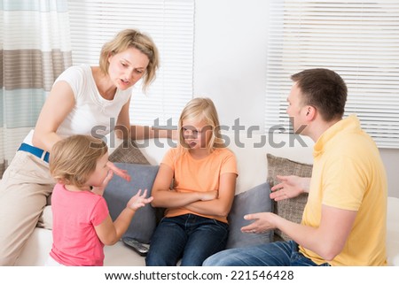 Angry Upset Family Having Argument At Home