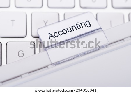 Closeup of Accounting tab attached to keyboard