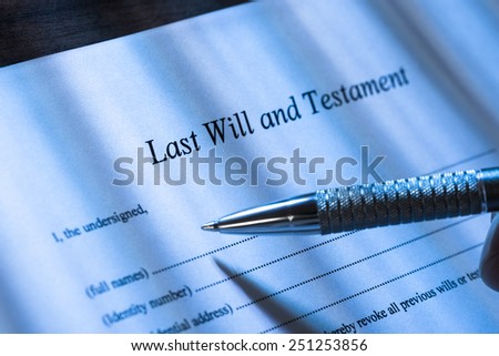 Close-up Of A Person Writing Last Will and Testament