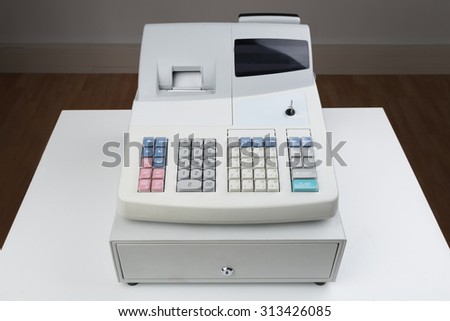 Close-up Of Electronic Cash Register Moneybox On Counter