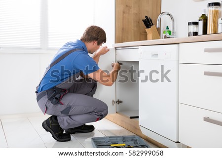 Similar – Image, Stock Photo young handyman installing wooden floor