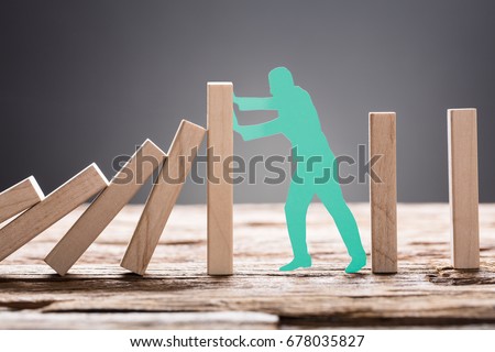 Similar – Image, Stock Photo The wooden domino blocks falling down