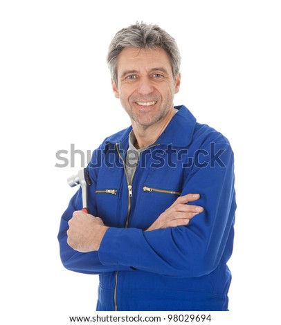 Similar – Image, Stock Photo Smiling workman in denim overall looking at camera