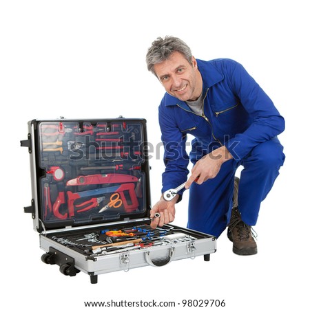 Similar – Image, Stock Photo Smiling workman in denim overall looking at camera