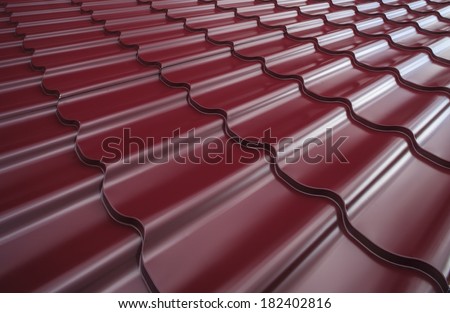 Steel roof painted in red color. Red roof.