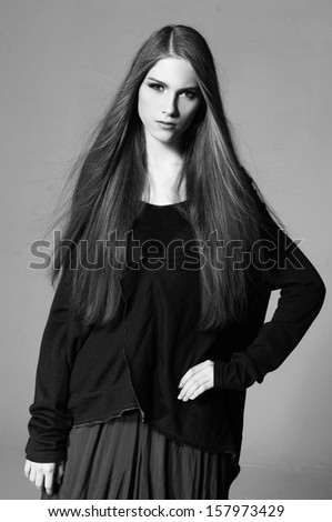 Sensual young woman with beautiful long brown hairs ,black and white photo