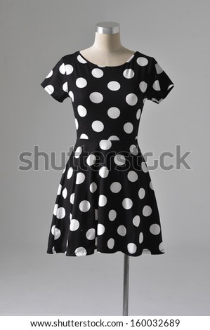 female dress mannequin isolated on gray background