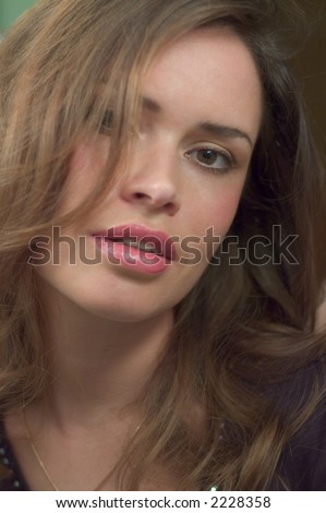 Sexy young brunette close head portrait with her mouth open