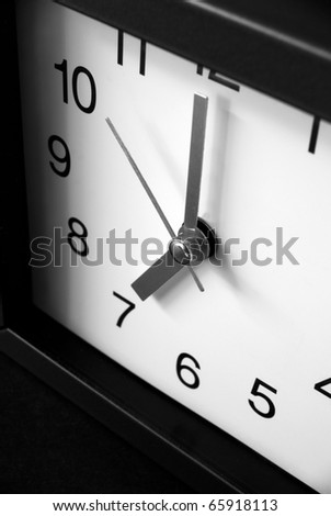 it's 7.00 o'clock! , a close-up of clock on dark background