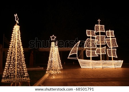 Christmas ship at night. In the Greek tradition ( especially in the islands ) it is common to ornament a ship  instead of a tree for Christmas