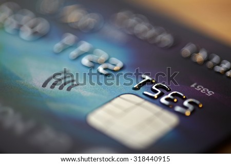 Low key macro shot with credit card.