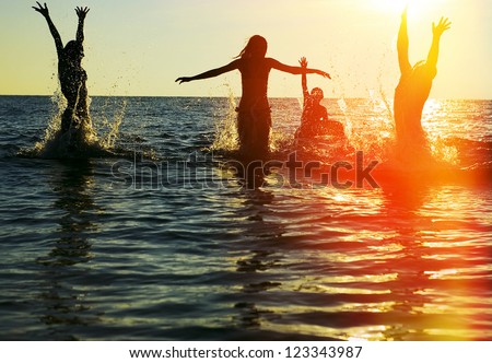 Similar – Image, Stock Photo Friends splashing with water guns