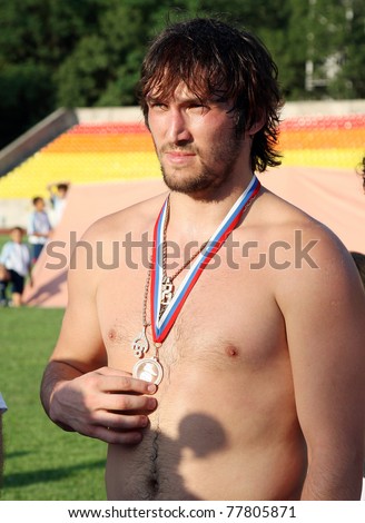 SOCHI, RUSSIA - JULY 4: Alexander Ovechkin after a friendly meeting on the football award for winning the game, which was held in support of the Olympic Winter Games of 2014 on July 4, 2009 in Sochi, Russia