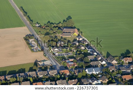 Urban sprawl in the Lower Rhine Region of Germany - Aerial view of Rheinberg, North Rhine-Westfalia, Germany, Europe