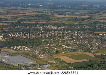 CItyscape of Rheinberg with industrial area and  agriculture in the Lower Rhine Region of Germany - Rheinberg, North Rhine-Westfalia, Germany, Europe