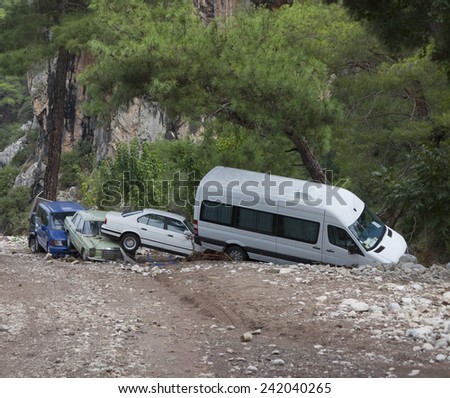 OLYMPOS, TURKEY - OCTOBER 14, 2009: Crashed cars after flood disaster in Olympos, Turkey.